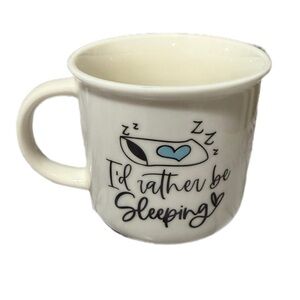 White Mug with Sleeping Eye Design